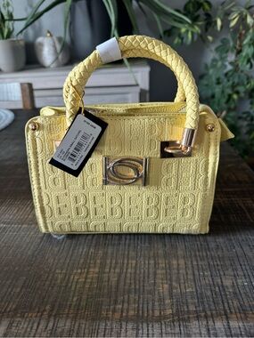 bebe Yellow Embossed Logo Braided-Handle Satchel